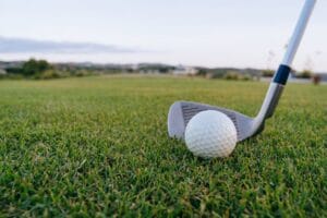 Close-up of a Golf Club and a Golf Ball
