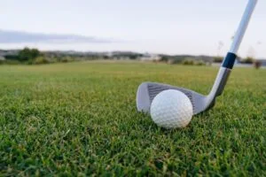 Close-up of a Golf Club and a Golf Ball