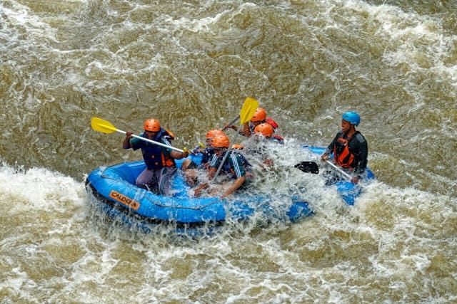 Group of Men River Rafting in Kashmir