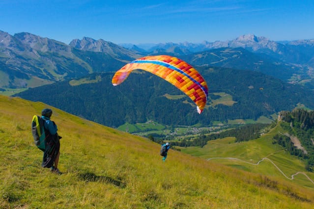 Men Paragliding In Kashmir