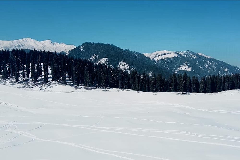 Snow-covered meadow of Pahalgam in winter